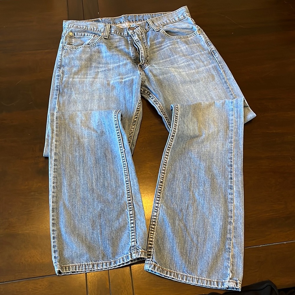 Levi 527s, 33x32, light wash, great condition.